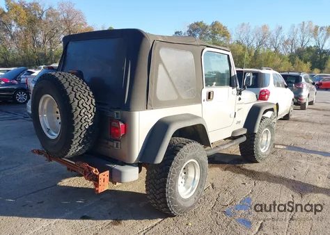 2002 Jeep Wrangler Sport z USA, uszkodzony, nr VIN 1J4FA49S12P717501